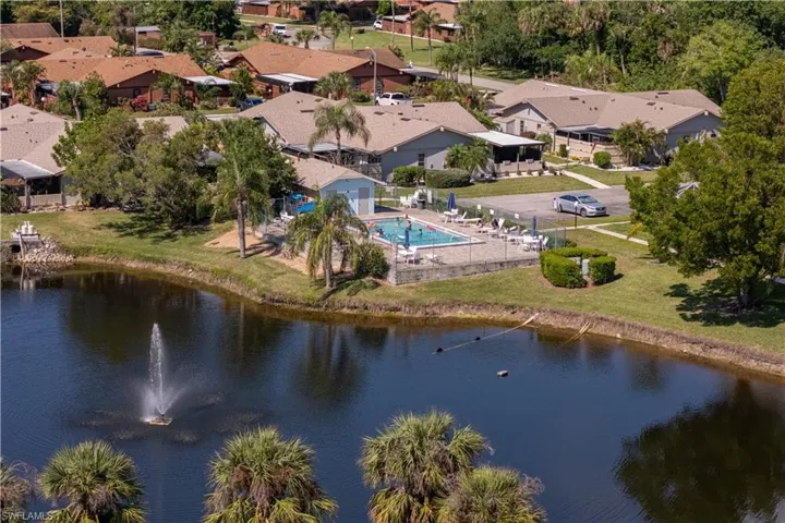Drone / aerial view featuring a residential view and a water view