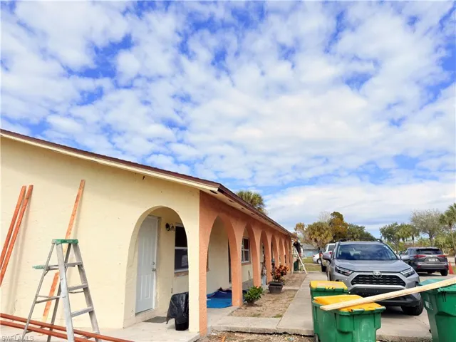 View of property exterior with stucco siding