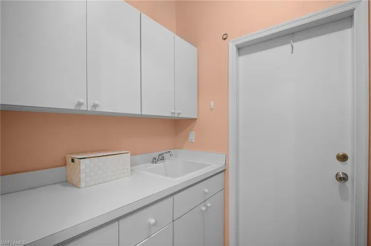 Laundry room with a sink
