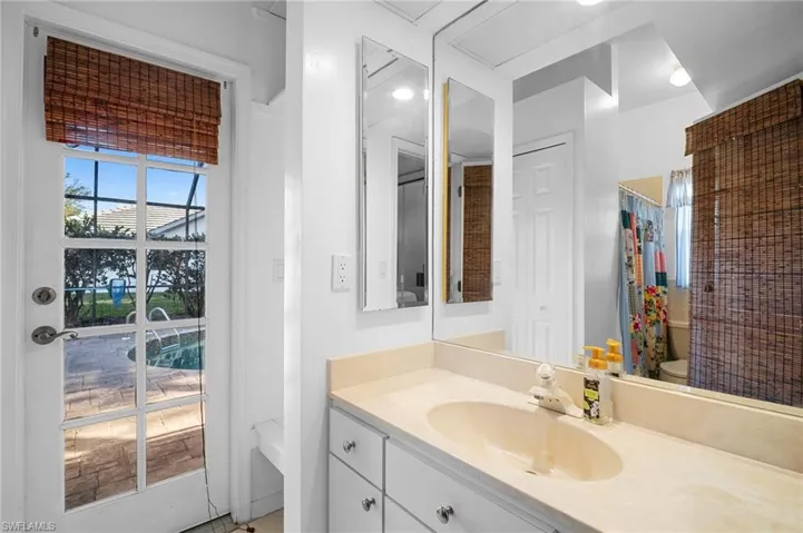Full bath featuring vanity and a shower with shower curtain