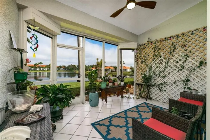Screened in Lanai off Living Room with View of Lake & Electric Hurricane   Shutters