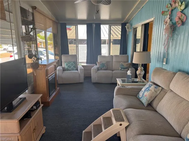 Living room with dark carpet