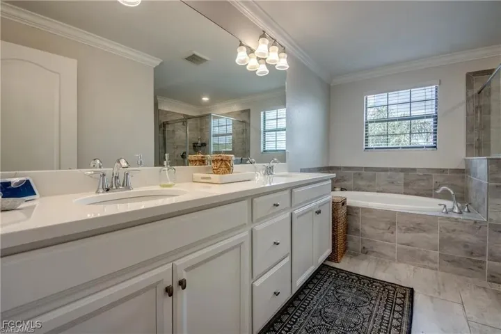 Master Bathroom featuring double vanity