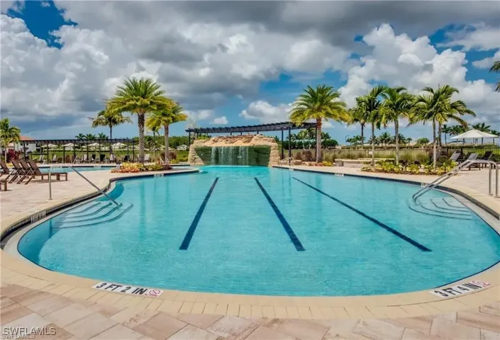 Resort style pool with waterfall and lap lanes