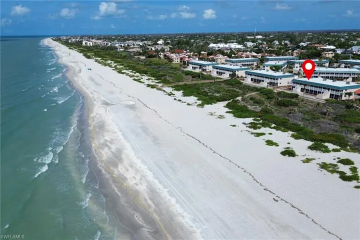 Bird's eye view of expansive beach just steps away!