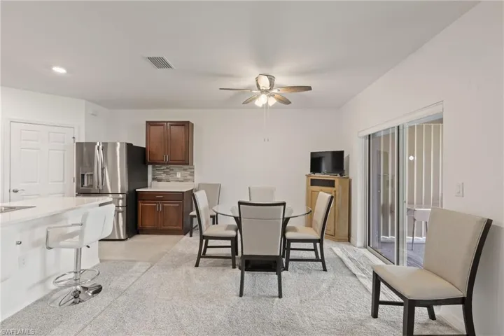 Dining space featuring ceiling fan
