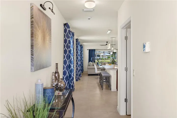 Front entry hallway, garage to the right