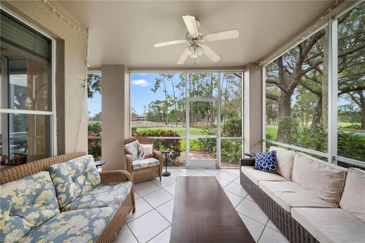 Sunroom / solarium featuring outdoor seating and ceiling fan