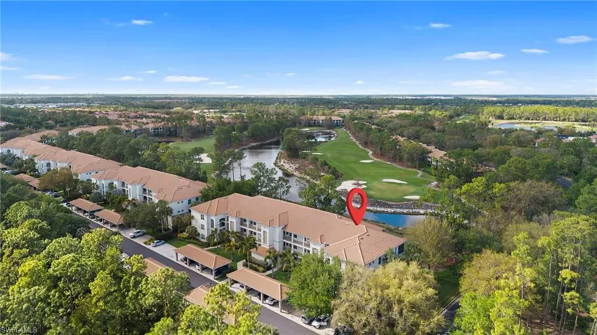 Bird's eye view of a golf club and a nearby body of water