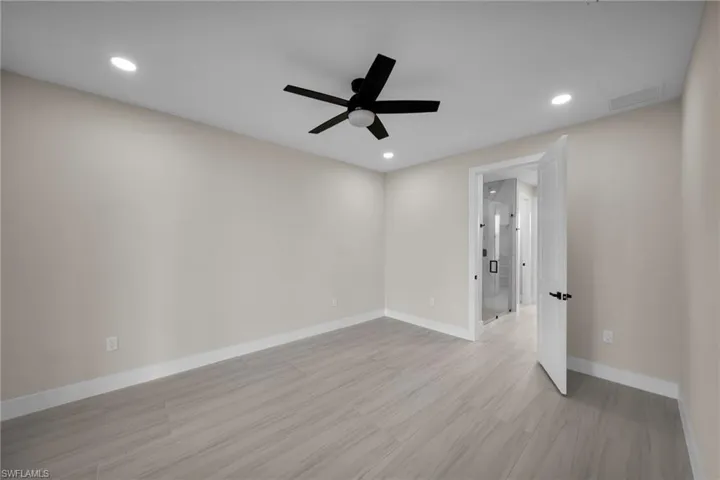 Spare room featuring ceiling fan, recessed lighting, and light wood-style floors