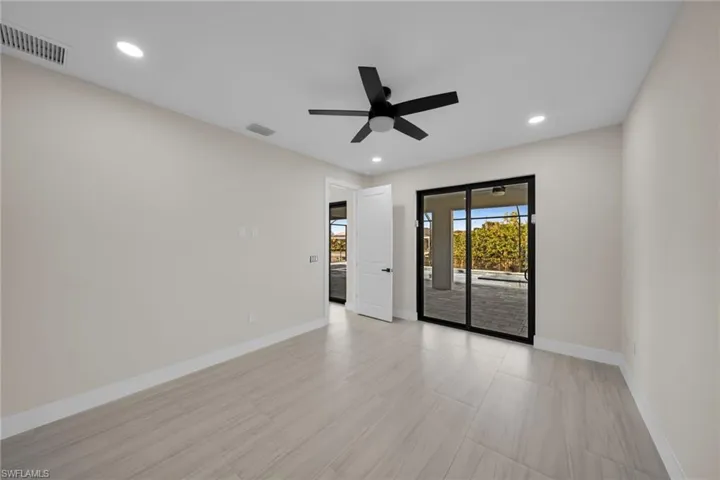 Spare room featuring recessed lighting and a ceiling fan