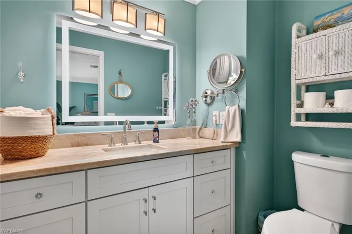 Bathroom featuring toilet and vanity