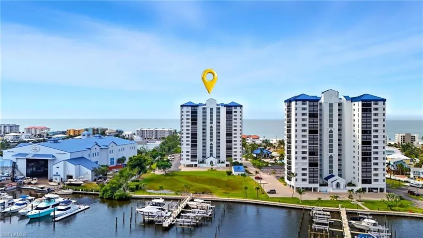 Water view with a dock and boat lift - Virtually Edited Image