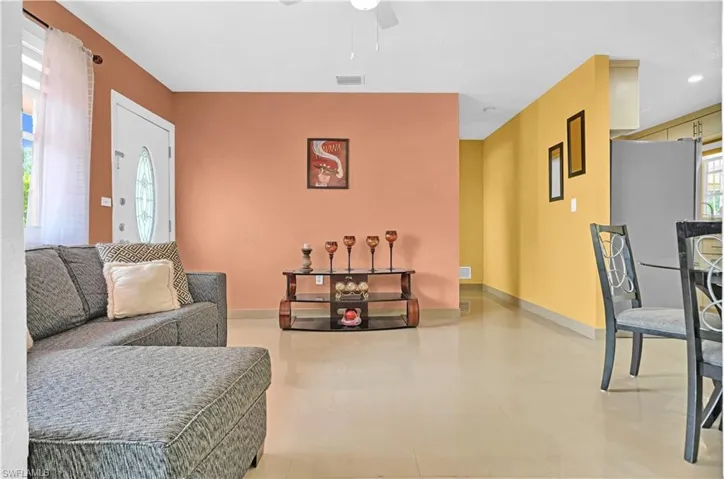 Living room featuring ceiling fan