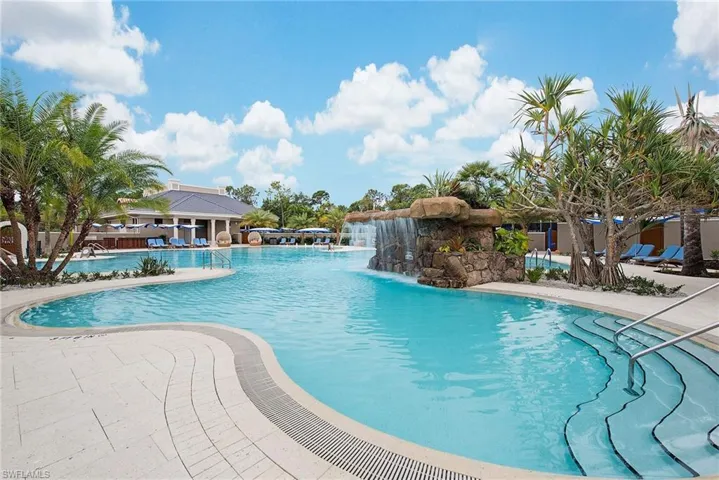 View of swimming pool featuring pool water feature