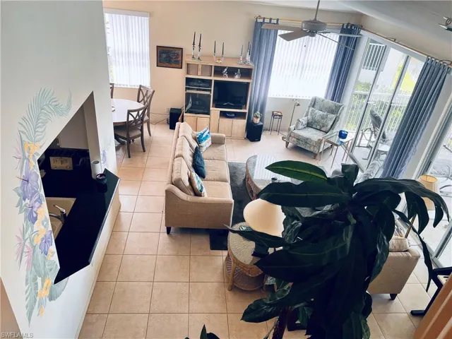 Tiled living area viewed from loft