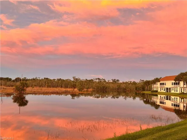 Sunset view of property back