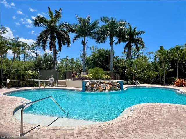 View of pool with water feature