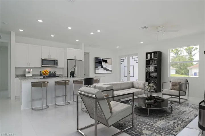 Living room with sink and ceiling fan