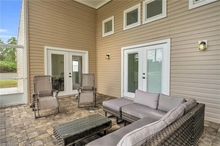 View of patio with an outdoor living space and french doors
