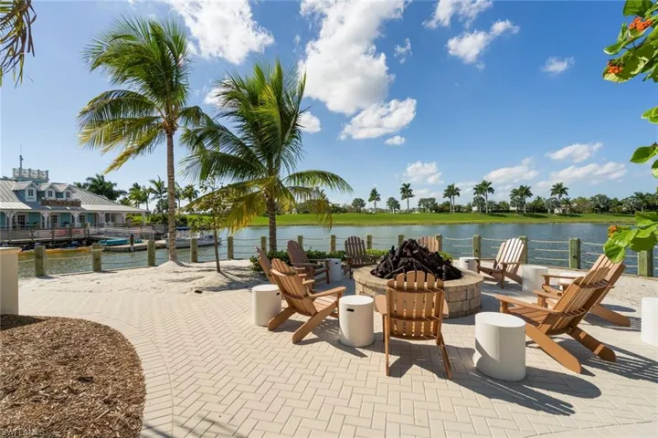 Relax and enjoy the lake and sunset views from the fire-it area behind the island club.