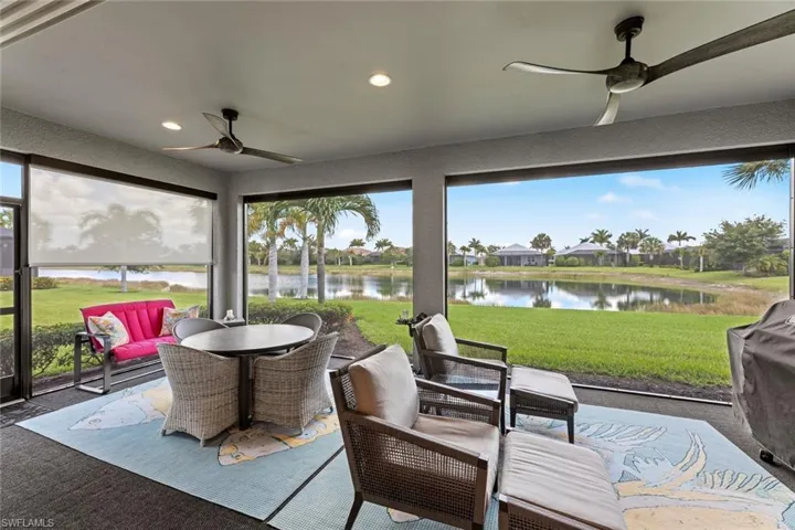 Large NO-SEE-UM screened lanai overlooks a lake with NW exposure. An ELECTRIC SUN SHADE has been installed at the end of the lanai. NEW ELECTRIC SUN SHADE (June 2020)