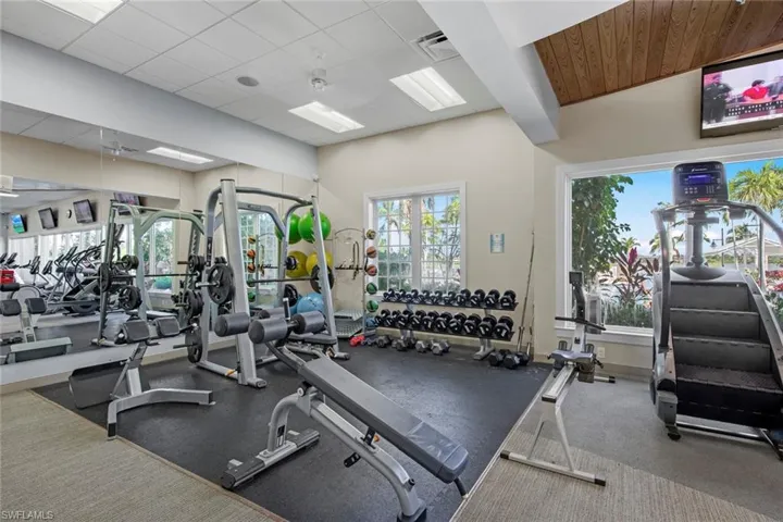 Exercise Room - The fitness center offers free weights, treadmills, stair stepper, rowing machine, elliptical machines, bikes, weight machines and separate yoga room.