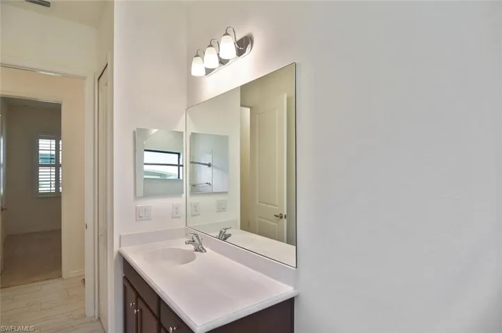 The Guest Bathroom is bright and well appointed