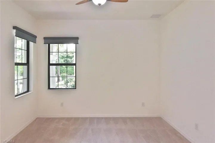 Matching windows keep the Den/Office bright and cheerful
