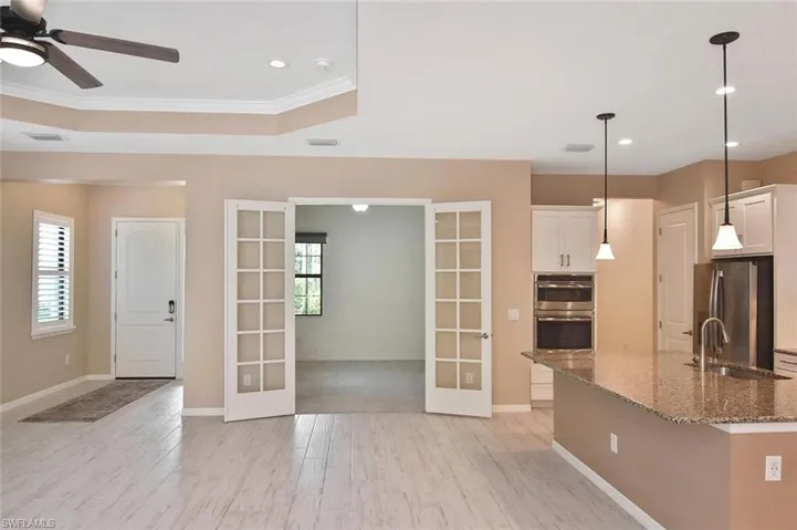 French doors open to the spacious Den/Office