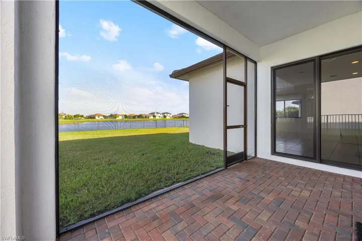 Screened in lanai in backyard.