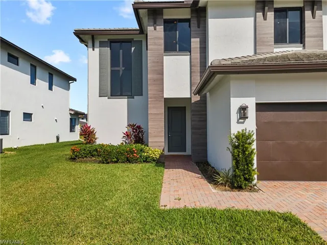 Paved walkway to front of home