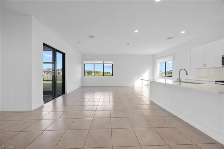 view of dining area and kitchen featuring tile throughout