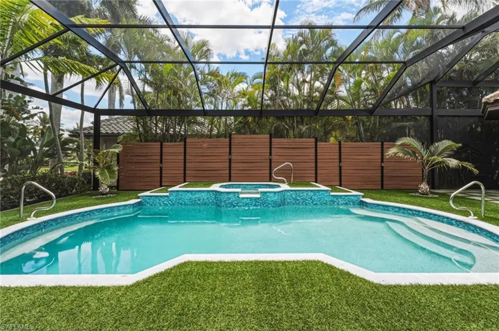 The pool has been fully resurfaced, with updated coping and new tile work completed in 2024, offering a fresh, modern finish.