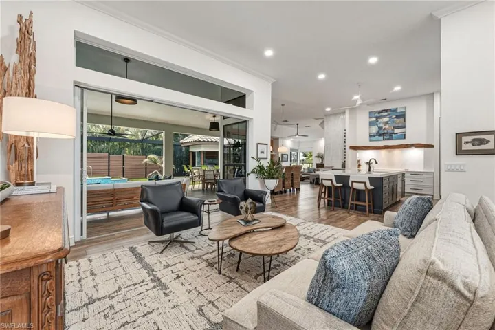 This exceptional remodel is centered around a stunning chef’s kitchen, beautifully complemented by two distinct living spaces—creating the perfect setting for both relaxed living and effortless entertaining.