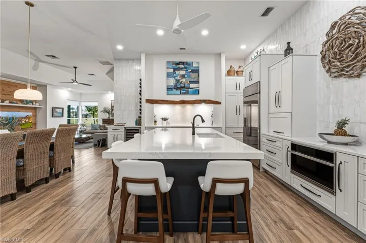 Enjoy views of the second fairway as you unwind in the additional living space, while the home itself flows seamlessly from one elegant area to the next.