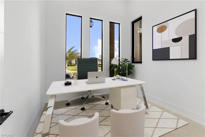 Home office featuring baseboards