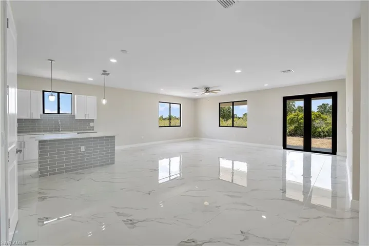 Unfurnished room featuring recessed lighting and a ceiling fan