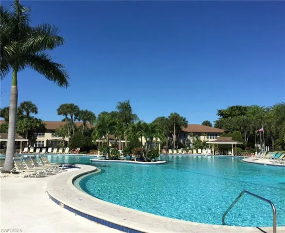 Community pool with a patio and a gazebo