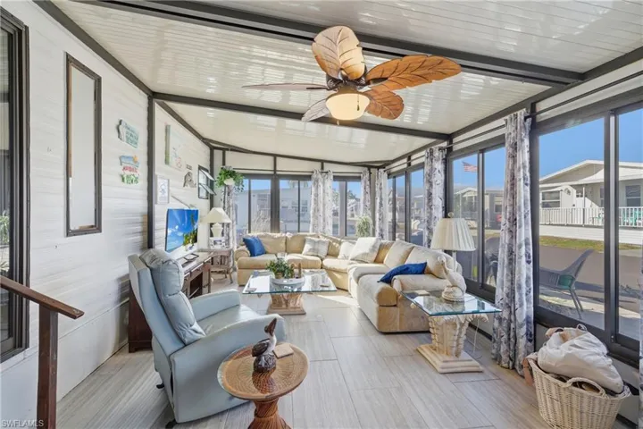 Sunroom with floor to ceiling windows