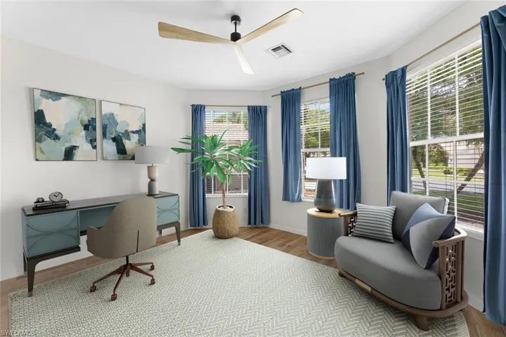 Virtually Staged Office area featuring French doors.