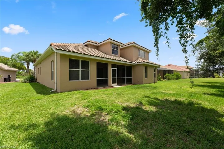 Back of house featuring room for a pool!