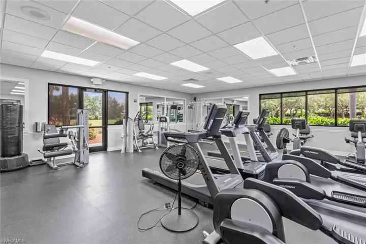 Exercise room featuring plenty of natural light