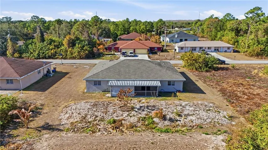Drone / aerial view of a tree filled landscape