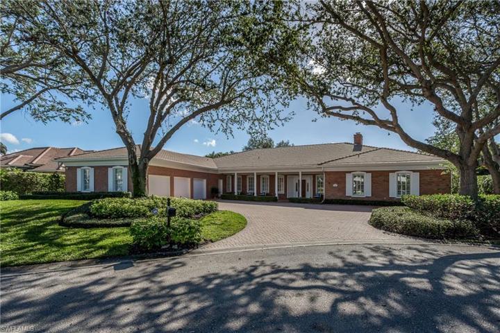 Fantastic oversized lot with elevated house among gorgeous oak trees and Landscapping.