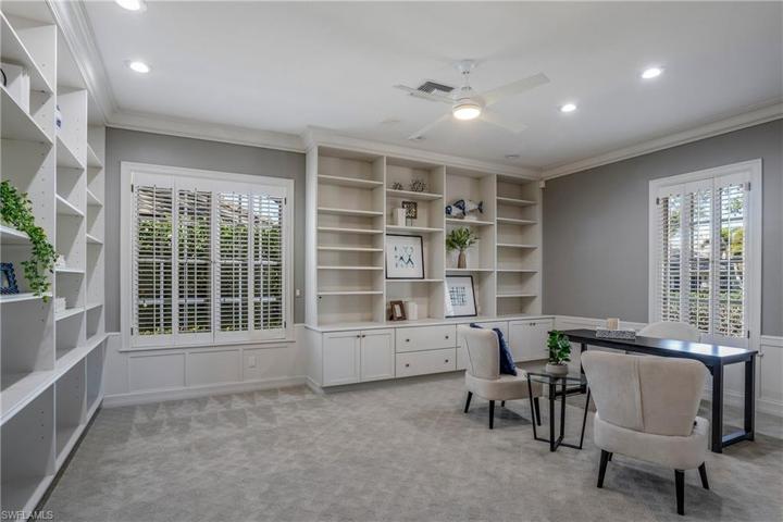 Office or fourth bedroom with built in cabinets.