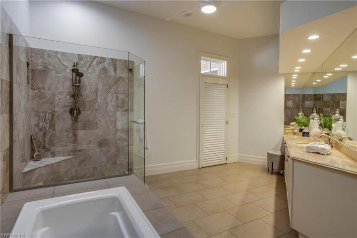 Upgraded bathroom with walk in closet.