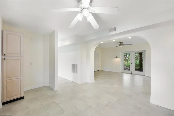 Kitchen area leading to dining and living room
