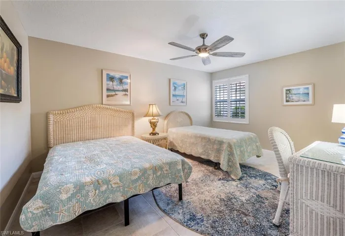 Bedroom featuring ceiling fan
