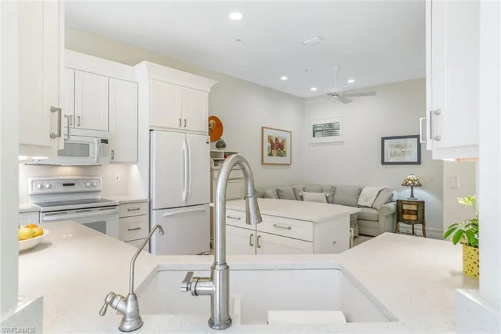 Kitchen has updated cabinets with quartz countertops!